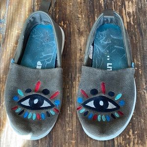 Native evil eye slip ons